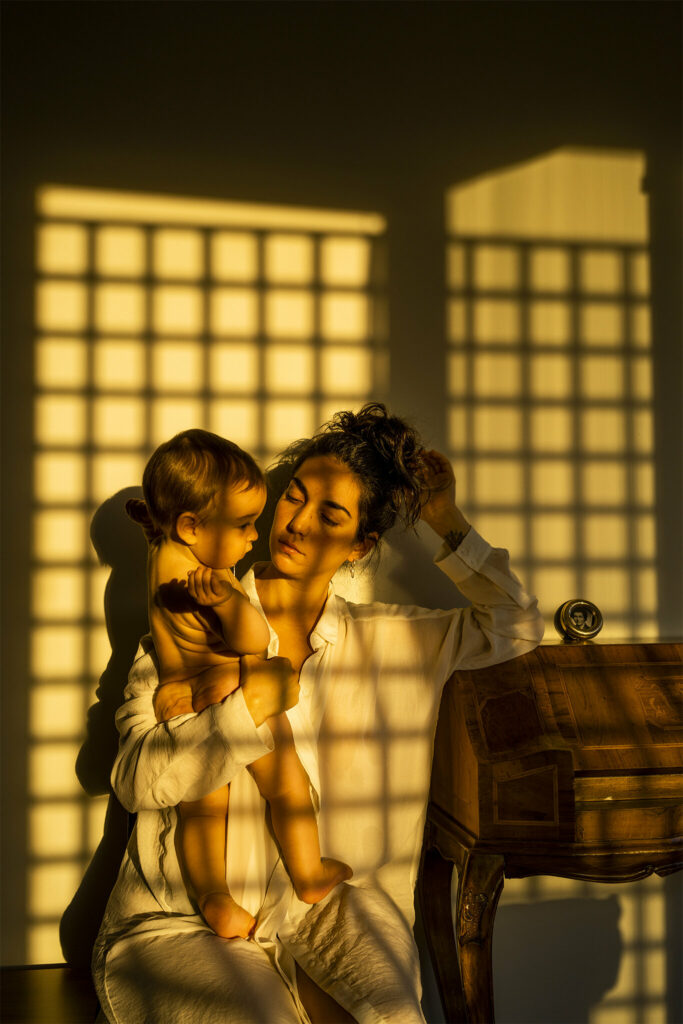 Photographer Tamara Merino takes a self-portrait with her son Ikal on their first day of quarantine during sunrise.