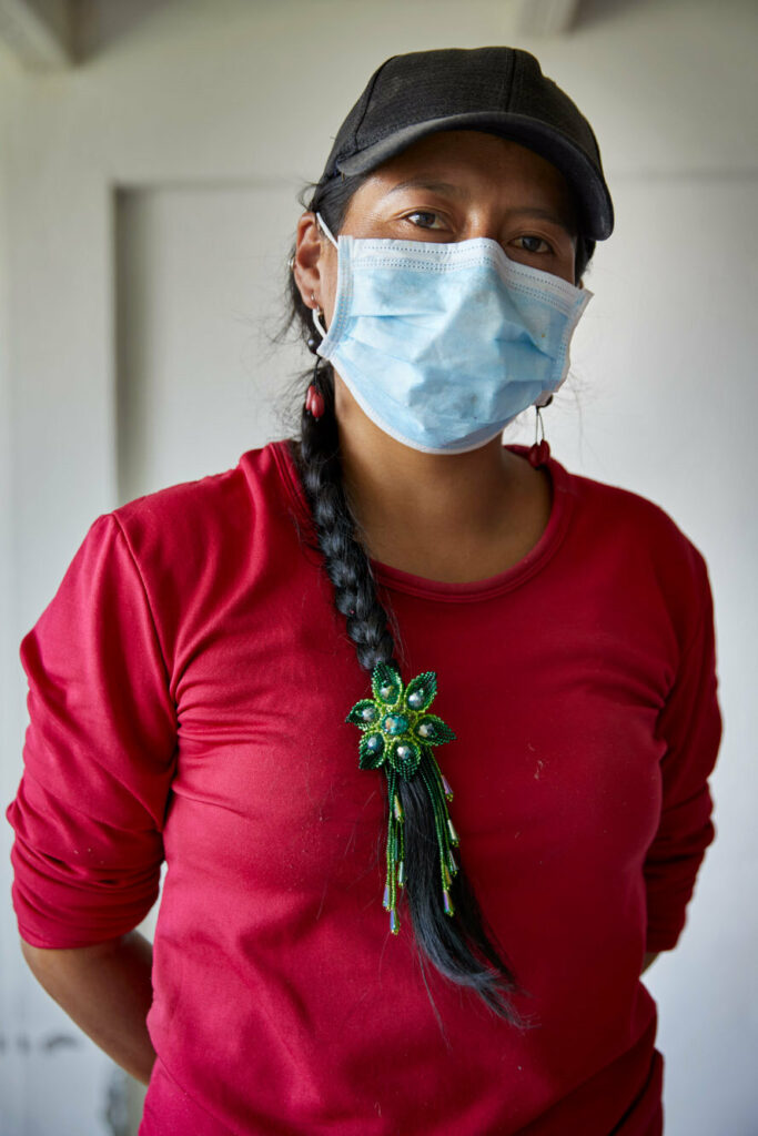 Sisa (Narcisa) Lozano Guayllas, a 33 year-old teacher from Saraguro, Ecuador, poses for the camera.